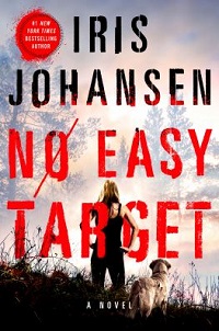 book cover for no easy target by iris johansen. A woman hikes through a misty field with a dog.