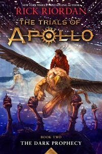 book cover for the trials of apollo book two the dark prophecy by rick riordan: a teen boy rides a griffon.